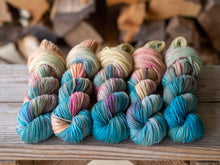 Load image into Gallery viewer, Saxon Blue, Rhubarb, Cochineal and Cutch Naturally Dyed DK
